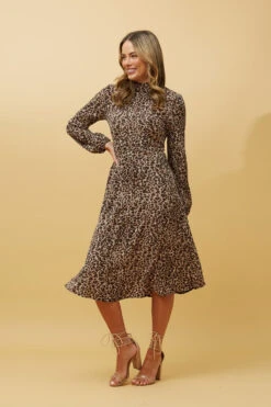 Stella SWEETIE ANIMAL PRINT MIDI DRESS -Femme Connection Sales 1391d71cec6e0aaf1b70e97cb082be85