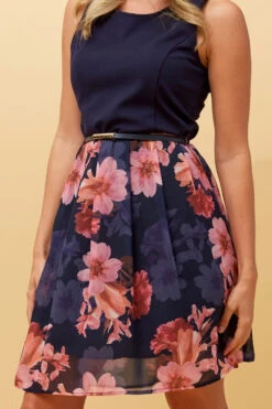 ROXANA SLEEVELESS FLORAL SHORT DRESS 16 ROXANA SLEEVELESS FLORAL SHORT DRESS -Femme Connection Sales 3e7eac6f17d79ac14cb39e379e17957d