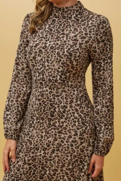 Stella SWEETIE ANIMAL PRINT MIDI DRESS -Femme Connection Sales 3ee54092f49c25e167c7e6500c672ec1