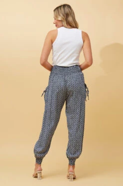 GEOMETRIC PRINT HAREM PANTS 15 GEOMETRIC PRINT HAREM PANTS -Femme Connection Sales 685cadba24e1097ab9d93d27b0e16af2