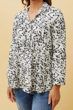 LILIANA ANIMAL PRINT TIERED TOP -Femme Connection Sales 6eff712be1fcbbec1f684e78d10448cf