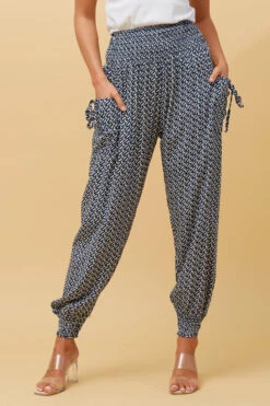 GEOMETRIC PRINT HAREM PANTS 12 GEOMETRIC PRINT HAREM PANTS -Femme Connection Sales 79b26b363f8d6b3209e09627f96d21bb