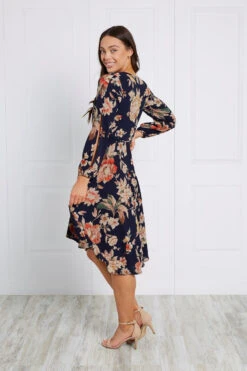 FLORAL WRAP DRESS 27 FLORAL WRAP DRESS -Femme Connection Sales 83fd235e6c4db2306acd9105b08d090e