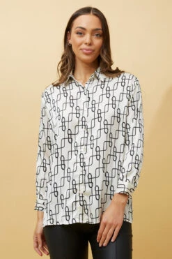 HADIL ABSTRACT PRINT SATIN SHIRT 12 HADIL ABSTRACT PRINT SATIN SHIRT -Femme Connection Sales 9787531c05c92ab232cb67bcfb230993