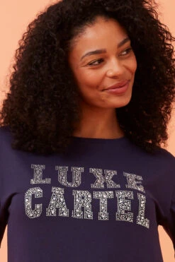 BINDI EMBELLISHED GRAPHIC PRINT TOP 26 BINDI EMBELLISHED GRAPHIC PRINT TOP -Femme Connection Sales a7c77db4b8ad025fe2587a19c074f068