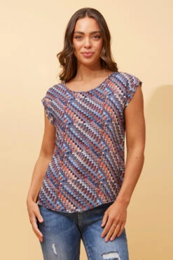 SHELLY ABSTRACT PRINT TOP 12 SHELLY ABSTRACT PRINT TOP -Femme Connection Sales b3689fc37f37252eb37afb742a090490