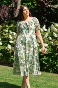 FAITH BOW FRONT MIDI DRESS -Femme Connection Sales c9dc61e2a15e367a4bc22dadd34411a7