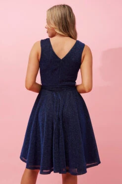 SLEEVELESS SHORT GLITTER DRESS 38 SLEEVELESS SHORT GLITTER DRESS -Femme Connection Sales d7c390a8f354fac4ae9c72ef271ddfb3