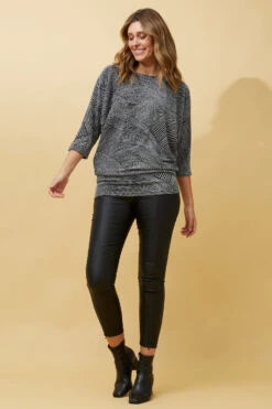 GLITTER SWIRL TOP -Femme Connection Sales e1a7214a4f2e031375a4b83b4183b7b4 be2692bc 896d 45c4 bf56 d97040c150da