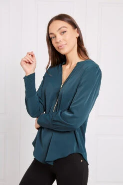 Stella LONG SLEEVE ZIP FRONT TOP 28 Stella LONG SLEEVE ZIP FRONT TOP -Femme Connection Sales e2d940baf64ef40e4d507516ceeb7de1