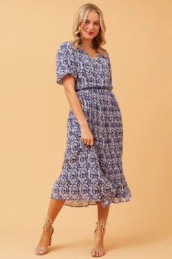 EDINA PLEATED FLORAL MIDI DRESS -Femme Connection Sales f5a2fdd2bdd6bd39d58fd3c00bc6c758 001d3d8f f3ce 4ef5 a2b3 30906ffbe56c