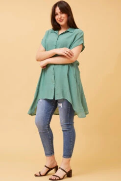 BLU ASYMMETRICAL HEM SHIRT -Femme Connection Sales f8aef939f49e386b67a660255e36e34b